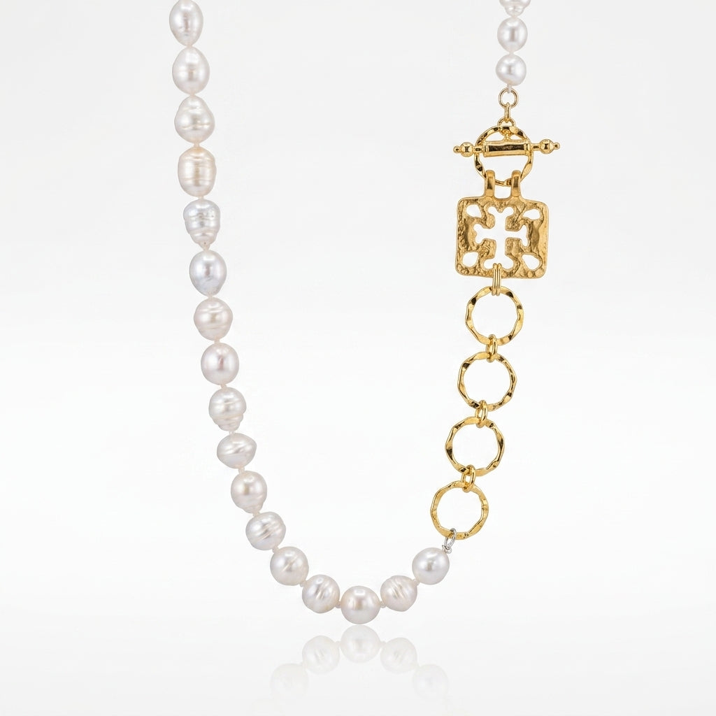 Handmade gold pearl necklace with Roman replica pendant
38" — Sennod